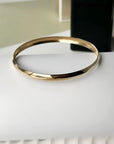 10K Yellow Gold Round Bangle | 8 Inches, 5.5mm Wide | Sleek & Polished Gold Bracelet